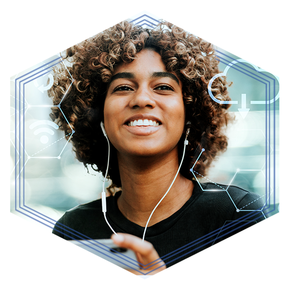 Woman smiling with earphones in